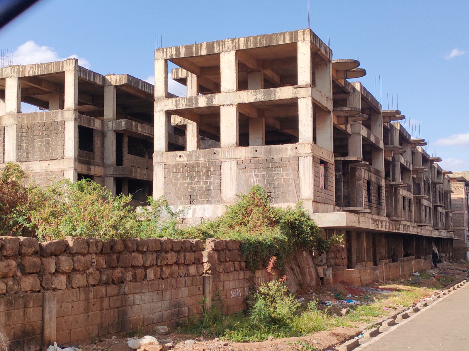 PUBLIC AUCTION OF INCOMPLETE BLOCK OF FLATS